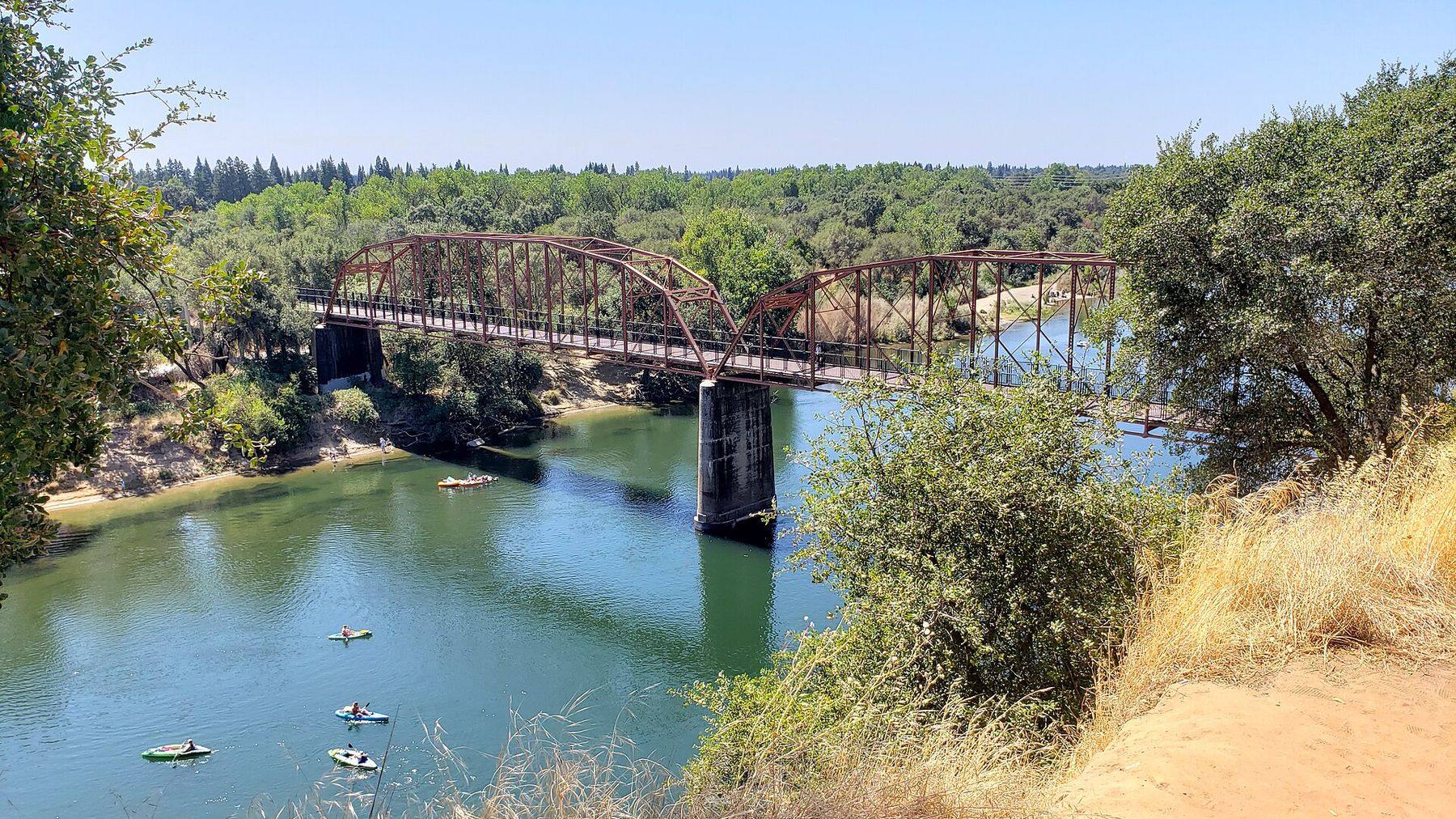 The American River at Fair Oaks, kayaks below the old iron bridge